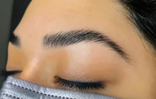 Image of a Brow Lamination done at On Fleek Studio for the Brow Laminations vs Microblading beauty blog post.