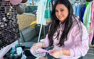 OFS at The SoCo Market. In this image, Brittney Tolosa the owner mixes a Hydrojelly Mask.